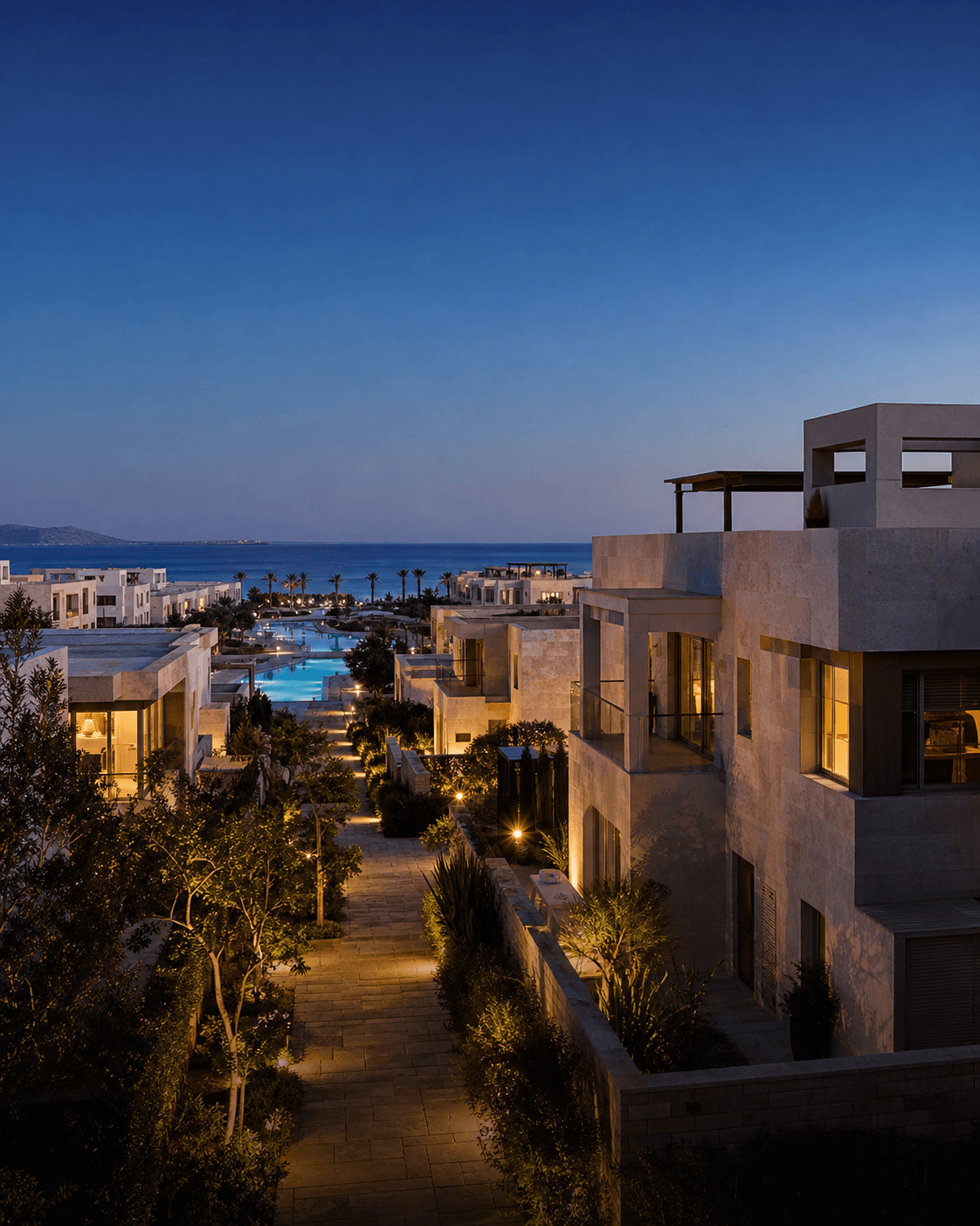 Low-rise Red Sea residential development illuminated at blue hour